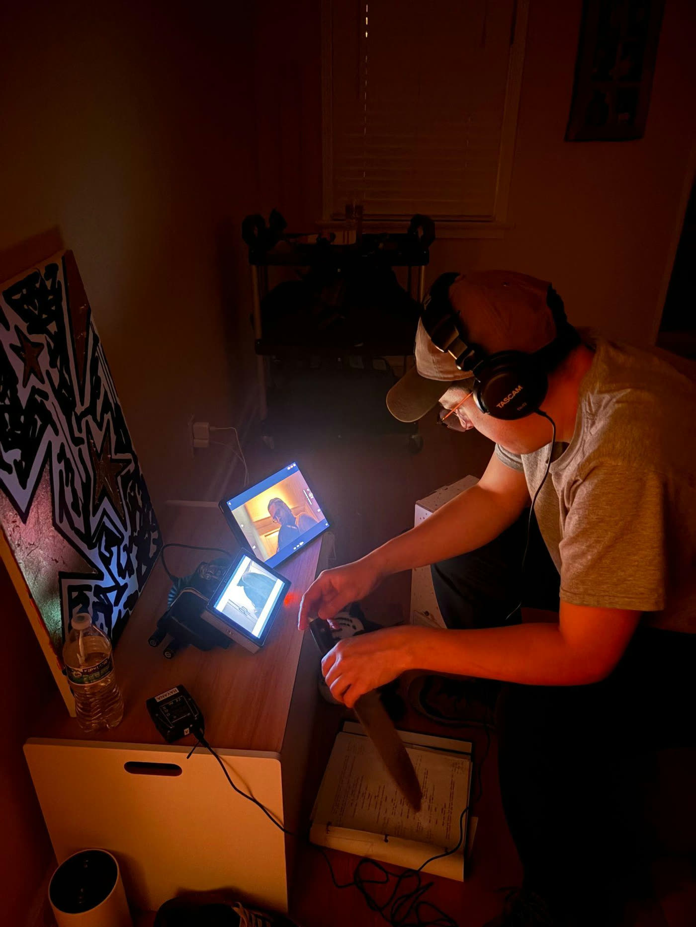 Sound design in progress at a cluttered desk.